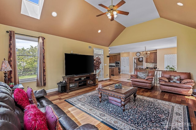 9 Narrow Brook Ct, Plainsboro, NJ 08536 - living room with wood finished floors, lofted ceiling, a chandelier, a ceiling fan, and recessed lighting