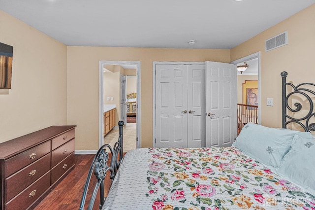 9 Narrow Brook Ct, Plainsboro, NJ 08536 - bedroom featuring dark wood-type flooring, ensuite bathroom, baseboards, and a closet