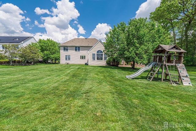 9 Narrow Brook Ct, Plainsboro, NJ 08536 - rear view of property featuring a playground and a yard