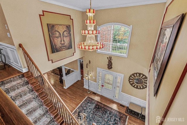 9 Narrow Brook Ct, Plainsboro, NJ 08536 - stairs with wood finished floors, ornamental molding, and wainscoting