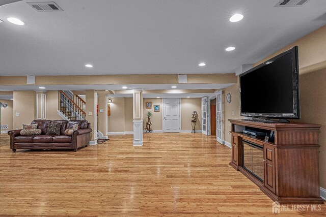 9 Narrow Brook Ct, Plainsboro, NJ 08536 - living area with baseboards, light wood-type flooring, recessed lighting, and stairs