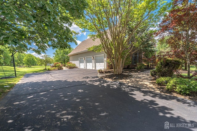 9 Narrow Brook Ct, Plainsboro, NJ 08536 - view of side of home featuring a lawn