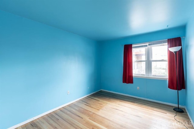 182 Evergreen Rd Unit 9A, Edison, NJ 08837 - empty room featuring wood finished floors and baseboards
