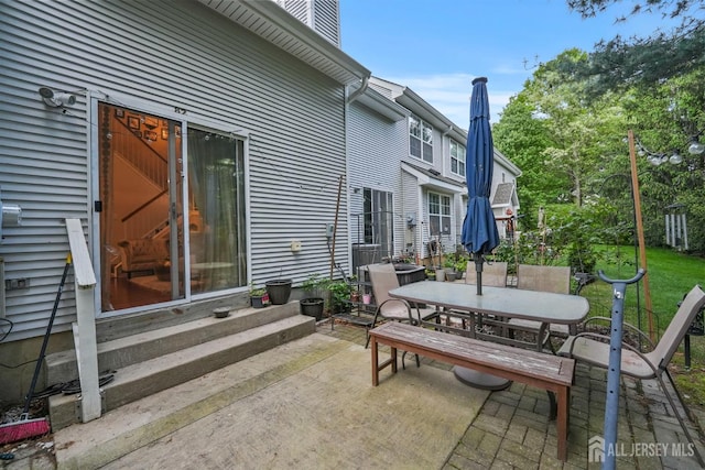 82 Heather Ct, South Brunswick, NJ 08852 - view of patio with outdoor dining space and entry steps