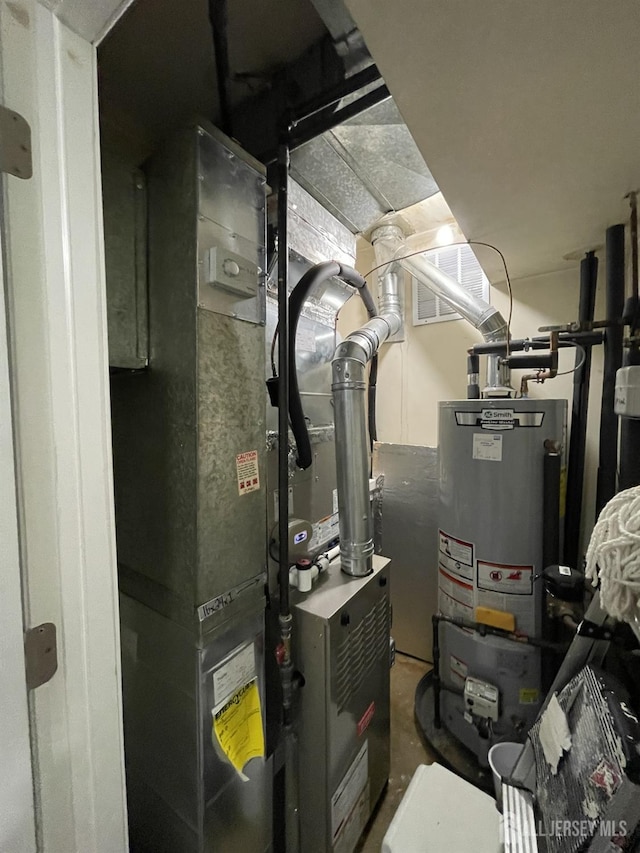 23 Hanover Sq Unit 23D, Middlesex, NJ 08846 - utility room featuring water heater