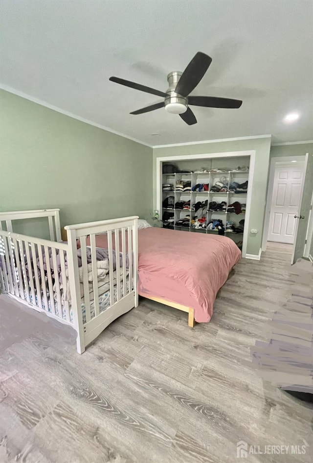 23 Hanover Sq Unit 23D, Middlesex, NJ 08846 - bedroom featuring crown molding, wood finished floors, and a ceiling fan