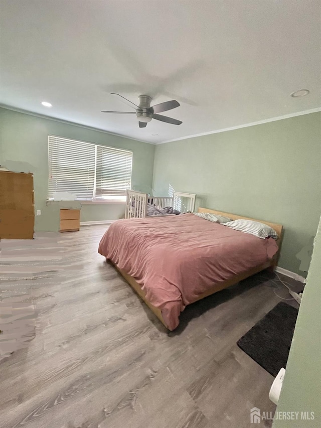 23 Hanover Sq Unit 23D, Middlesex, NJ 08846 - bedroom featuring wood finished floors, ornamental molding, ceiling fan, and recessed lighting
