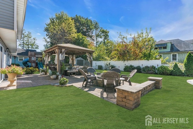 view of yard with a gazebo, a patio area, and fence