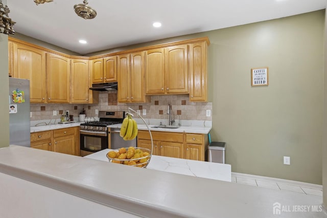 1905 Dahlia Cir S, Brunswick, NJ 08810 - kitchen with stainless steel appliances, light countertops, tasteful backsplash, tile patterned flooring, and recessed lighting