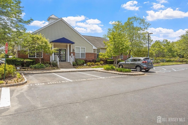 1905 Dahlia Cir S, Brunswick, NJ 08810 - view of building exterior with uncovered parking