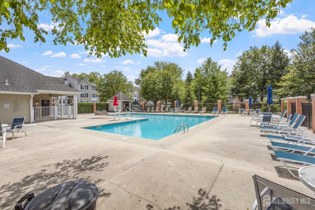 1905 Dahlia Cir S, Brunswick, NJ 08810 - community pool with a patio area