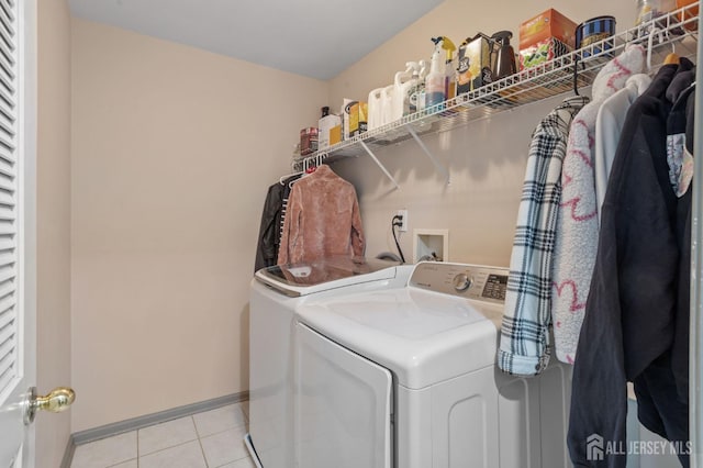 1905 Dahlia Cir S, Brunswick, NJ 08810 - laundry room featuring separate washer and dryer and light tile patterned flooring
