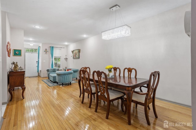 1905 Dahlia Cir S, Brunswick, NJ 08810 - dining space with light wood finished floors, a chandelier, and recessed lighting