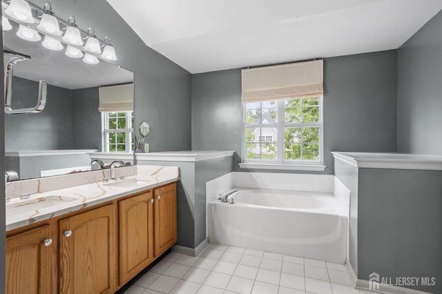 1905 Dahlia Cir S, Brunswick, NJ 08810 - bathroom featuring tile patterned floors, a garden tub, and double vanity