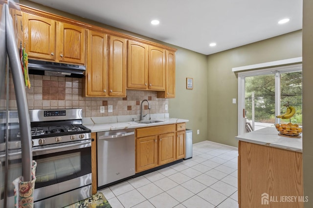 1905 Dahlia Cir S, Brunswick, NJ 08810 - kitchen featuring stainless steel appliances, ventilation hood, backsplash, light tile patterned floors, and light stone counters
