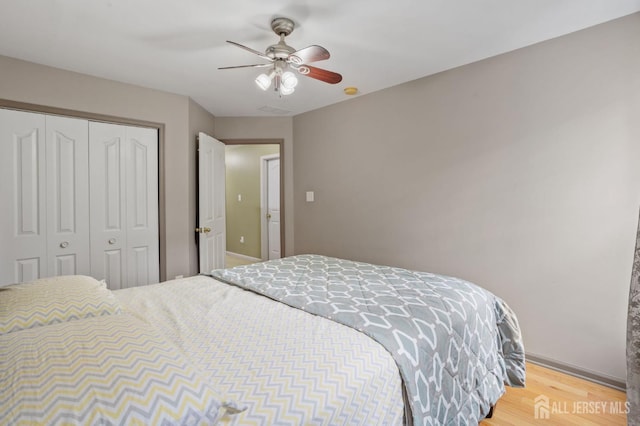 1905 Dahlia Cir S, Brunswick, NJ 08810 - bedroom with wood finished floors, a closet, and ceiling fan
