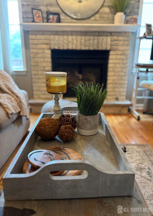 20 N Shore Blvd Unit B, Helmetta, NJ 08828 - detailed view of wood finished floors and a brick fireplace