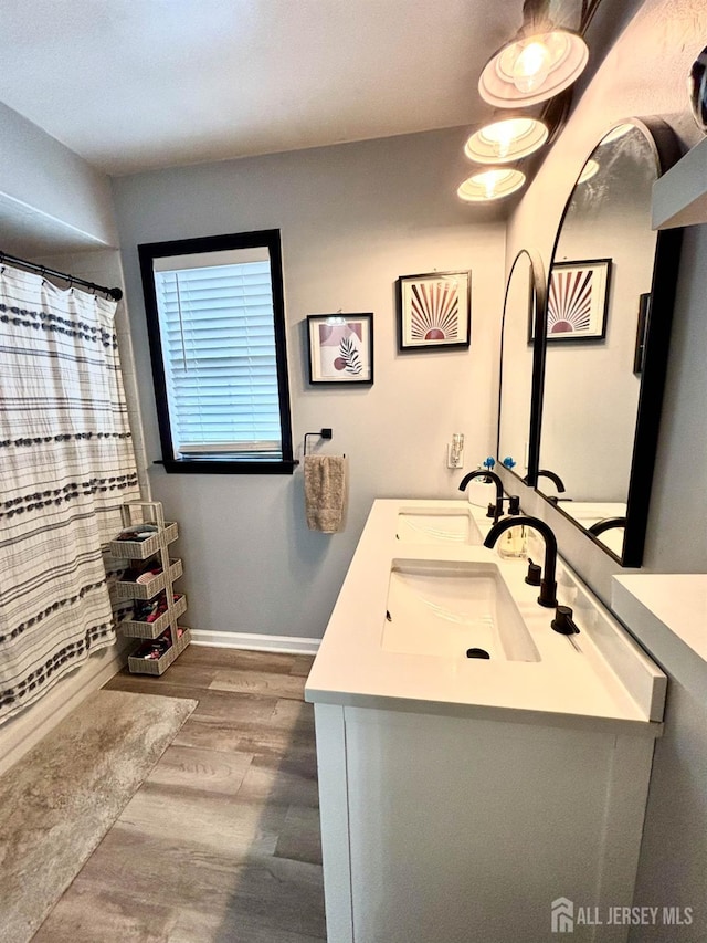 20 N Shore Blvd Unit B, Helmetta, NJ 08828 - full bath featuring double vanity, wood finished floors, and a shower with curtain