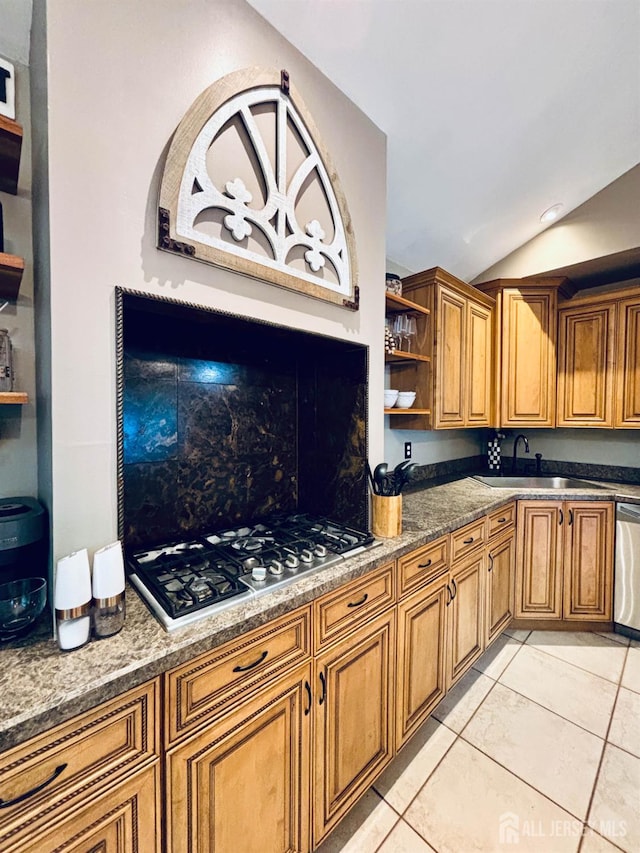 20 N Shore Blvd Unit B, Helmetta, NJ 08828 - kitchen featuring open shelves, appliances with stainless steel finishes, lofted ceiling, and brown cabinetry