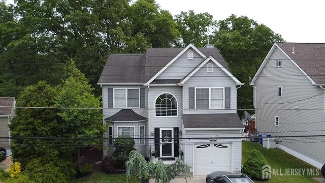 20 N Shore Blvd Unit B, Helmetta, NJ 08828 - traditional-style house with a garage and a shingled roof