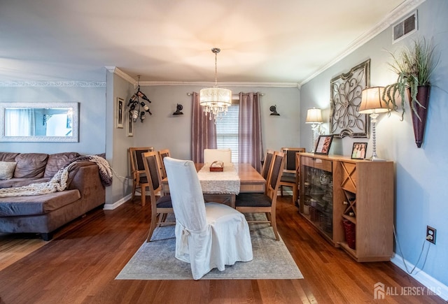 20 N Shore Blvd Unit B, Helmetta, NJ 08828 - dining room with a chandelier, wood finished floors, and crown molding
