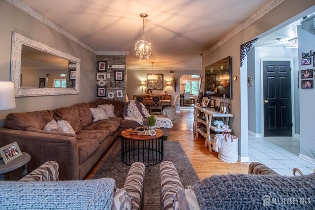 20 N Shore Blvd Unit B, Helmetta, NJ 08828 - living area featuring a chandelier, crown molding, and wood finished floors