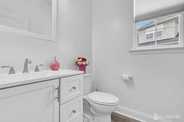 10 E Black Heath Ct, Howell, NJ 07727 - half bath with vanity and wood finished floors