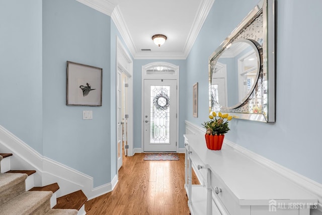 10 E Black Heath Ct, Howell, NJ 07727 - entryway featuring stairs, light wood-style floors, and ornamental molding