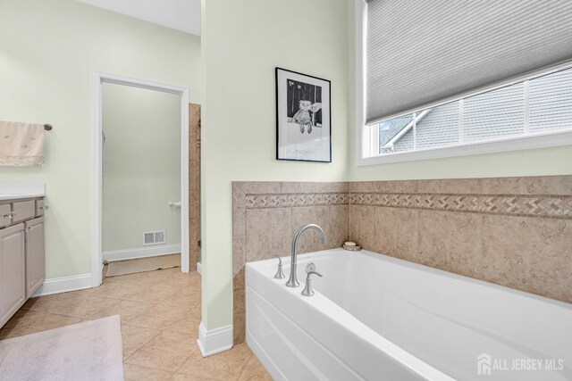 10 E Black Heath Ct, Howell, NJ 07727 - full bathroom featuring a bath, vanity, and tile patterned floors
