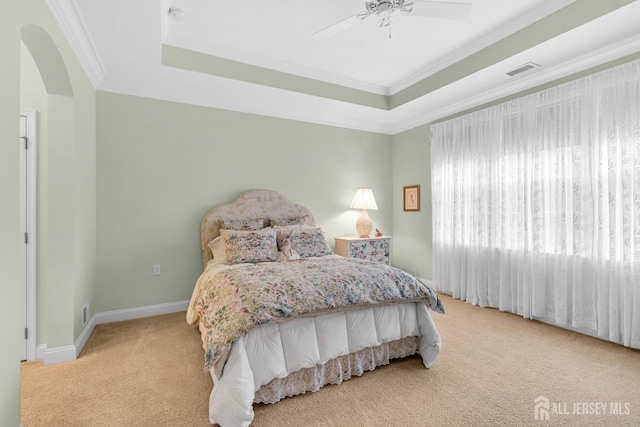 10 E Black Heath Ct, Howell, NJ 07727 - bedroom with carpet floors, arched walkways, ornamental molding, a raised ceiling, and ceiling fan