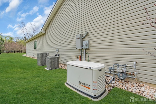 10 E Black Heath Ct, Howell, NJ 07727 - view of side of home with a cooling unit and a lawn