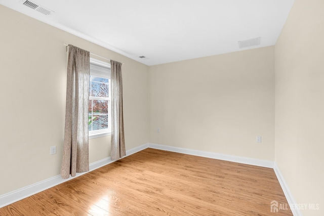 10 E Black Heath Ct, Howell, NJ 07727 - empty room with light wood finished floors and baseboards