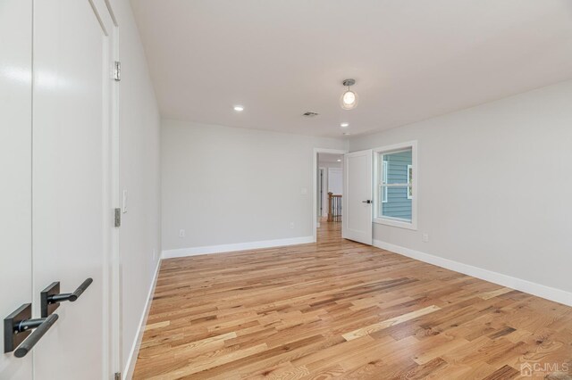 unfurnished bedroom featuring light hardwood / wood-style floors