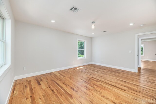 empty room with light wood-type flooring