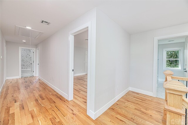 hall featuring light hardwood / wood-style floors