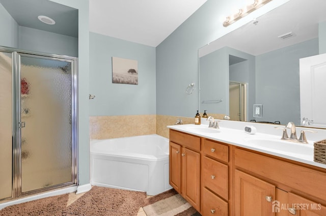 2022 Edward Stec Blvd, Edison, NJ 08837 - bathroom featuring a shower stall, a bath, double vanity, and tile patterned flooring