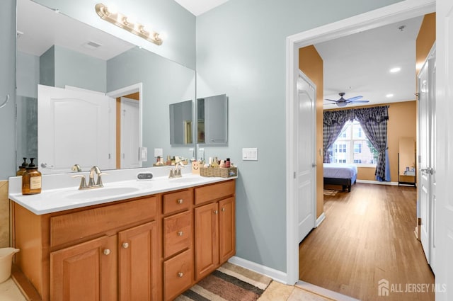 2022 Edward Stec Blvd, Edison, NJ 08837 - ensuite bathroom with double vanity, a ceiling fan, baseboards, and recessed lighting