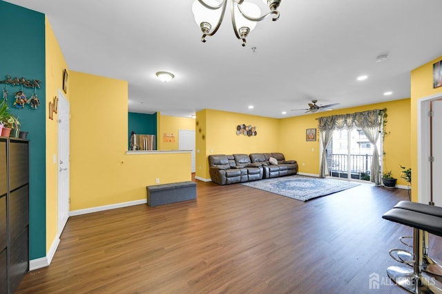 2022 Edward Stec Blvd, Edison, NJ 08837 - living area featuring wood finished floors, a ceiling fan, recessed lighting, baseboards, and a chandelier
