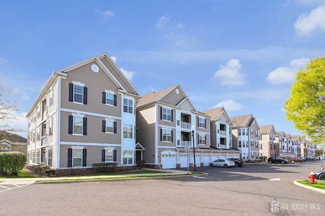 view of building exterior with a residential view