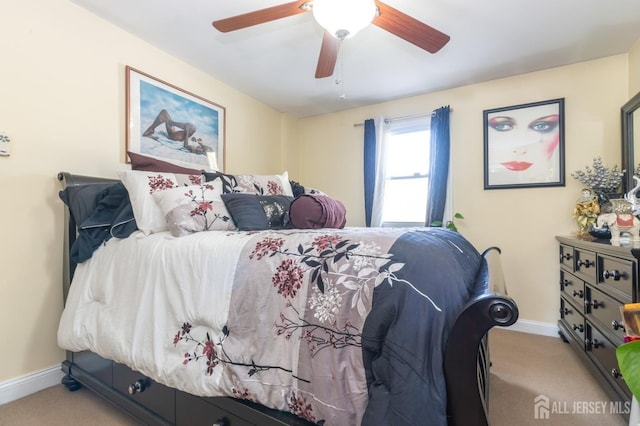 bedroom featuring ceiling fan, baseboards, and carpet flooring