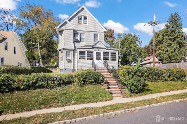 victorian-style house with stairway