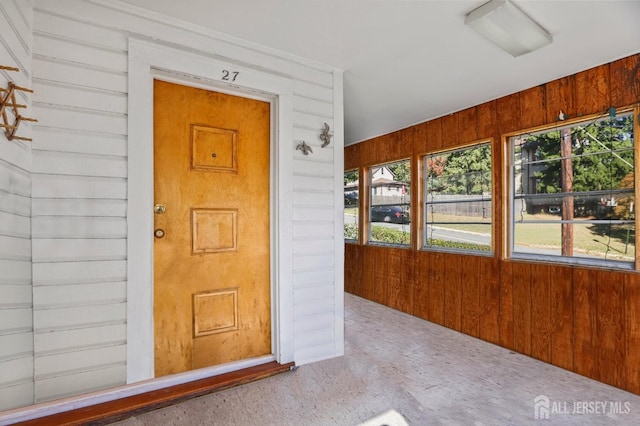 property entrance featuring covered porch