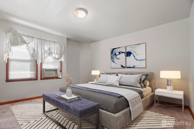 carpeted bedroom with baseboards and cooling unit