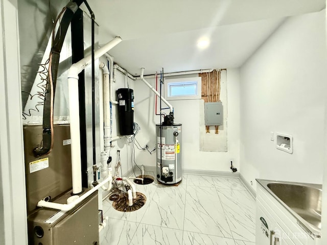 utility room with gas water heater, electric panel, and a sink