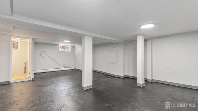 basement featuring a baseboard radiator