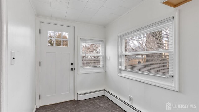 doorway with a baseboard radiator and crown molding