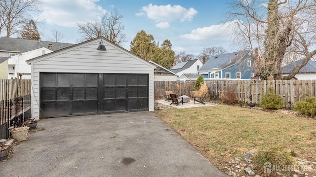 detached garage with fence