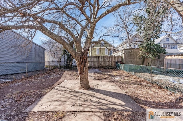 view of yard featuring a fenced backyard and a patio area
