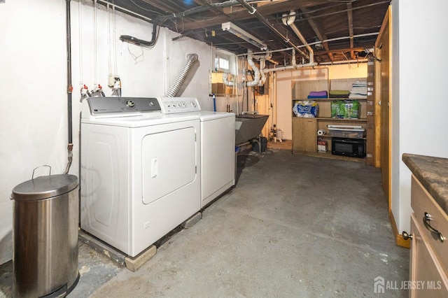 294 Fresh Pond Rd, South Brunswick, NJ 08902 - unfinished below grade area featuring washing machine and dryer