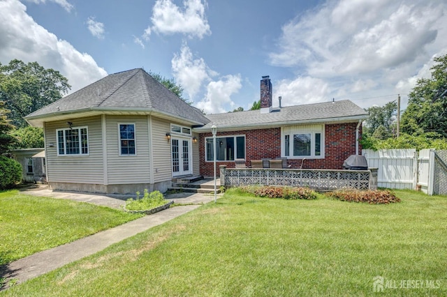 294 Fresh Pond Rd, South Brunswick, NJ 08902 - view of front facade featuring a chimney, french doors, and brick siding
